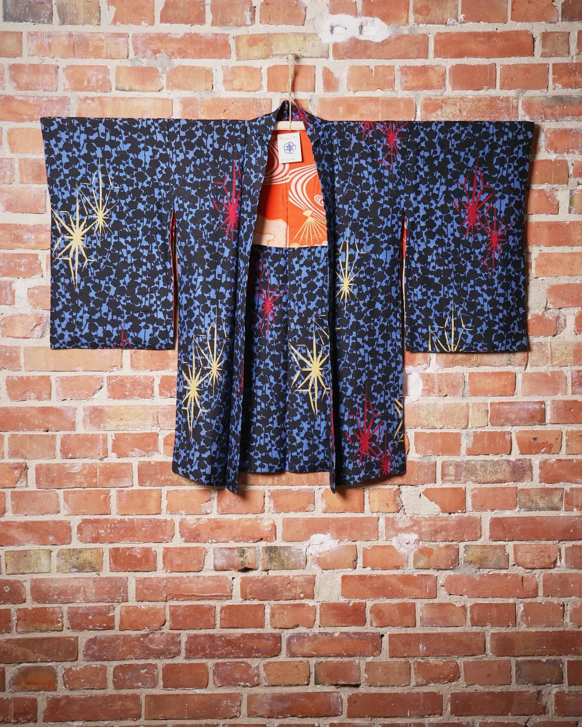 Blue-black haori with star motifs — view 1