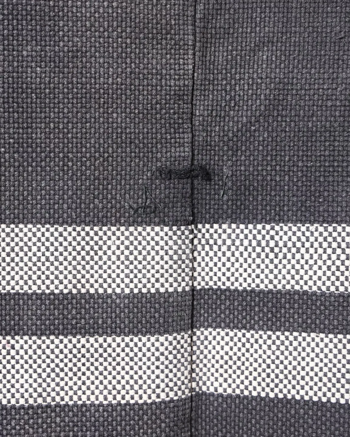 Dark jacket with lettering and red trim — view 7