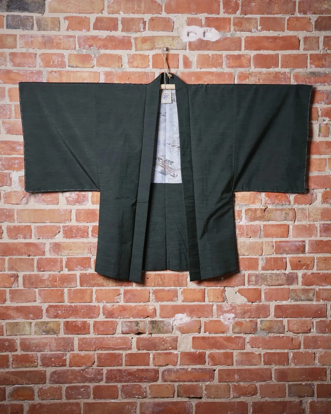 Dark green haori with a landscape lining — view 1