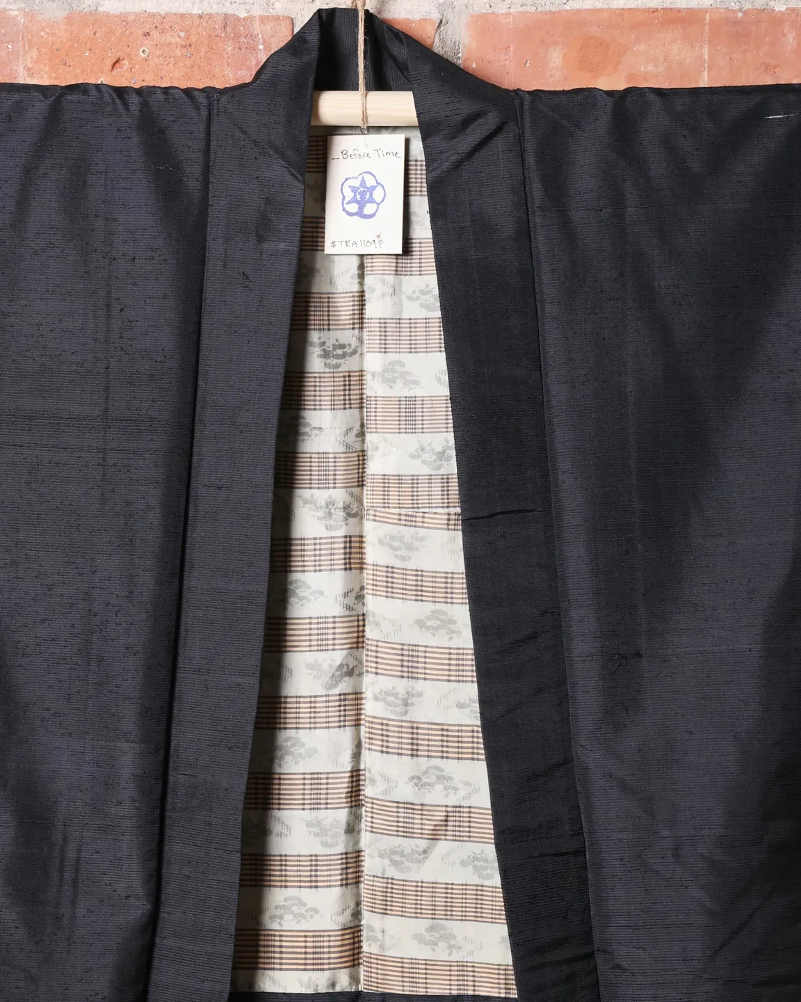 Dark textured haori with a pale striped lining — view 2