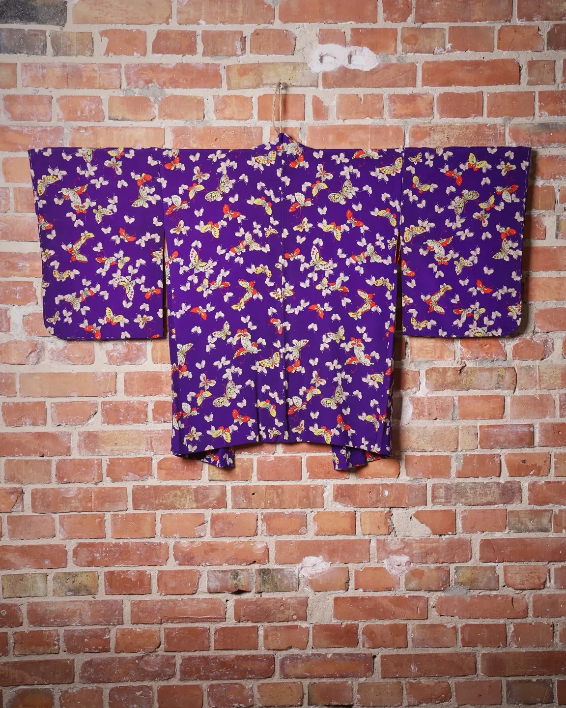 Purple butterfly haori with a red floral lining — view 3